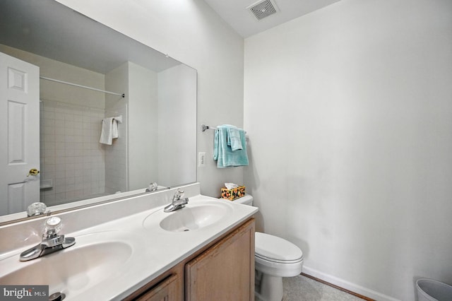 6949 Banchory Ct, Alexandria, VA 22315 - bathroom with double vanity, a shower, and tile patterned flooring