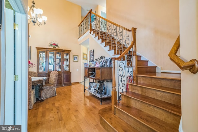 15 Kresson Ct, Berlin, NJ 08009 - stairway featuring a chandelier, a towering ceiling, and wood finished floors