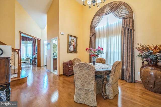 15 Kresson Ct, Berlin, NJ 08009 - dining space featuring wood finished floors, plenty of natural light, a chandelier, and high vaulted ceiling