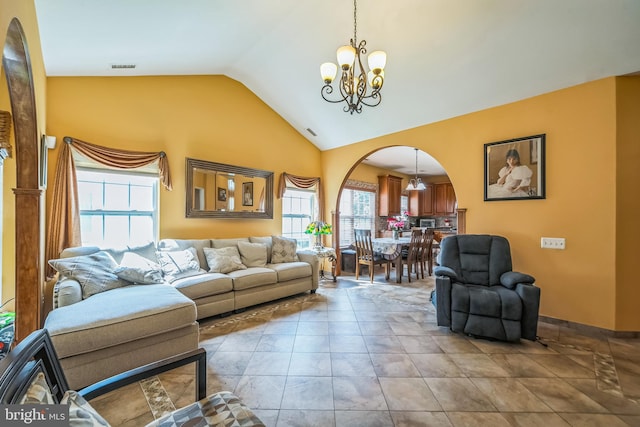15 Kresson Ct, Berlin, NJ 08009 - living area with a chandelier, healthy amount of natural light, arched walkways, and high vaulted ceiling