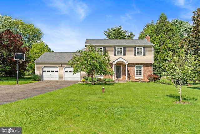 108 Walker Rd, Washington Crossing, PA 18977 - colonial inspired home featuring driveway, a chimney, a front lawn, a garage, and brick siding