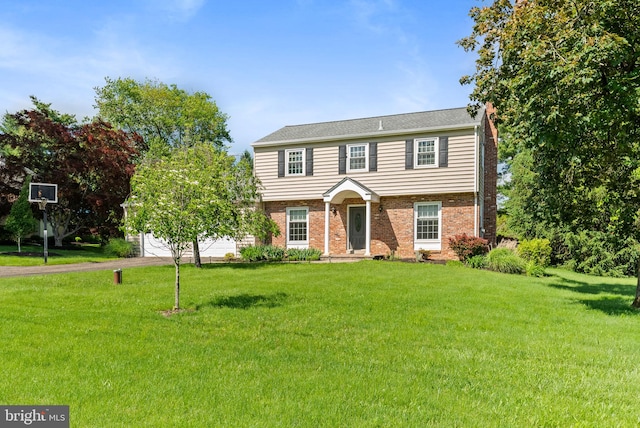 108 Walker Rd, Washington Crossing, PA 18977 - colonial-style house with brick siding, a front lawn, and asphalt driveway