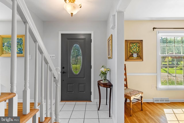 108 Walker Rd, Washington Crossing, PA 18977 - foyer entrance with stairs and light wood-type flooring