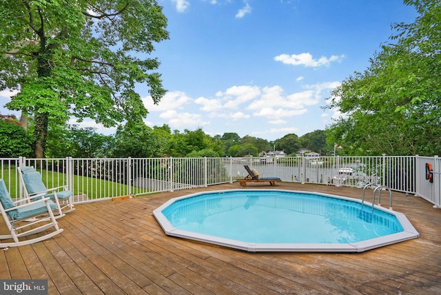 734 Oak Grove Cir, Severna Park, MD 21146 - view of swimming pool with a deck and view of scattered trees