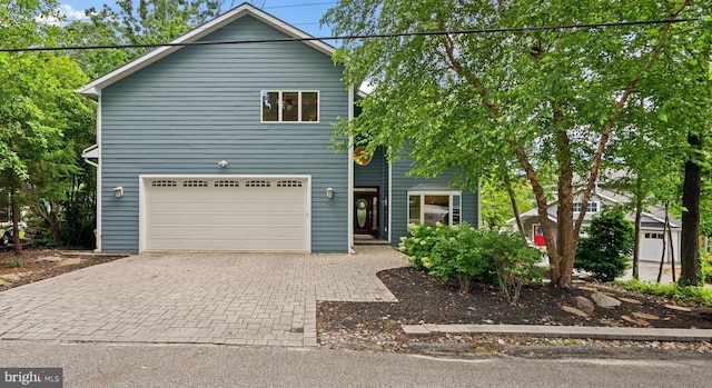 734 Oak Grove Cir, Severna Park, MD 21146 - view of front of property with driveway and a garage