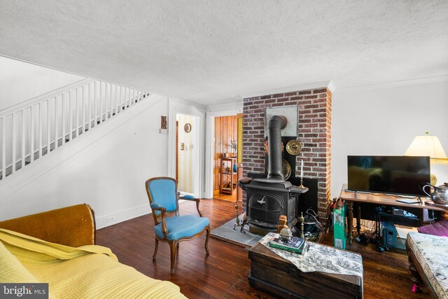 13321 Travilah Rd, Potomac, MD 20854 - living room with a textured ceiling, wood-type flooring, stairway, a wood stove, and ornamental molding