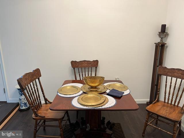 13321 Travilah Rd, Potomac, MD 20854 - dining area featuring wood finished floors