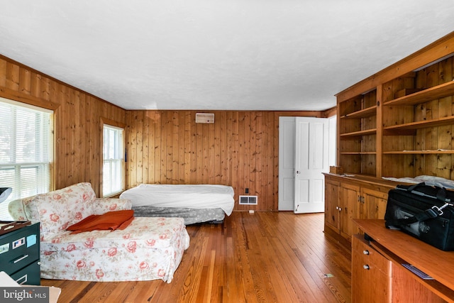 13321 Travilah Rd, Potomac, MD 20854 - bedroom featuring hardwood / wood-style floors and wooden walls