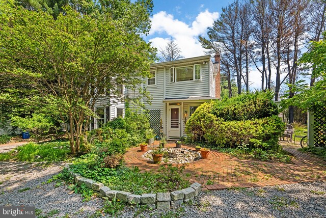 13321 Travilah Rd, Potomac, MD 20854 - view of front of house with a chimney
