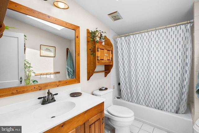 13321 Travilah Rd, Potomac, MD 20854 - full bath featuring vanity, shower / tub combo, tile patterned floors, and a skylight