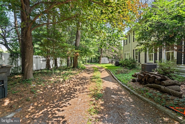 13321 Travilah Rd, Potomac, MD 20854 - view of yard with a storage unit