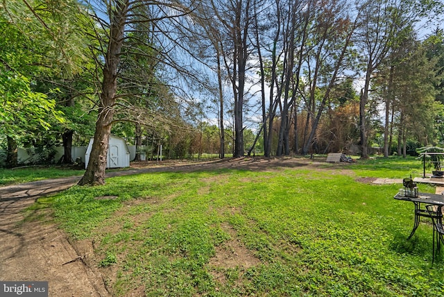 13321 Travilah Rd, Potomac, MD 20854 - view of grassy yard with a storage unit