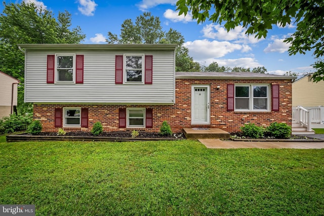 5315 Debbie Ct, Ellicott City, MD 21043 - split level home with a front yard and brick siding