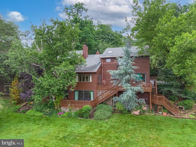 16 Golfview Ln, Reading, PA 19606 - rear view of property featuring stairway, a wooden deck, a chimney, and a lawn