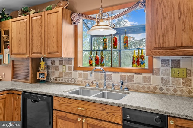 16 Golfview Ln, Reading, PA 19606 - kitchen with dishwasher, backsplash, light countertops, and hanging light fixtures