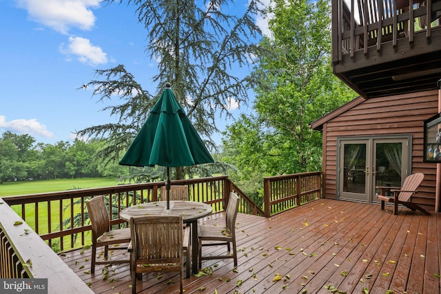 16 Golfview Ln, Reading, PA 19606 - wooden terrace featuring outdoor dining area, french doors, and view of scattered trees