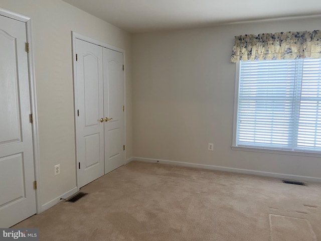 147 Saddletop Dr Unit 381, Taneytown, MD 21787 - unfurnished bedroom featuring light carpet and a closet