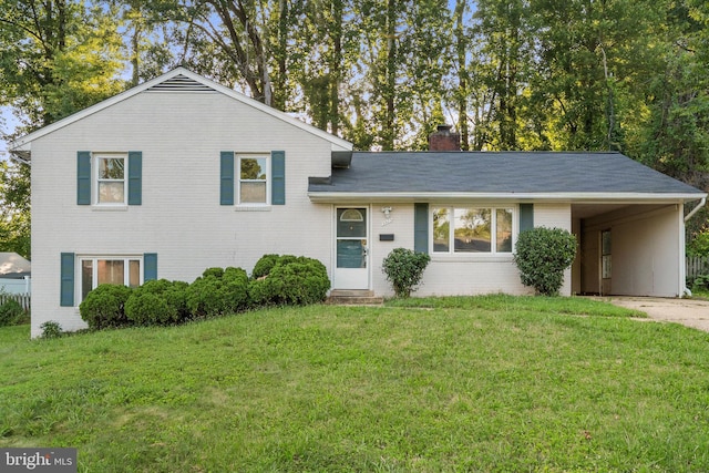 5505 Heming Ave, Springfield, VA 22151 - split level home featuring brick siding, a front lawn, driveway, and a chimney