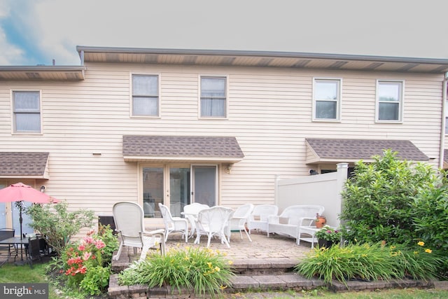 3920 Seneca Ct, Skippack, PA 19474 - rear view of house featuring a patio area and roof with shingles