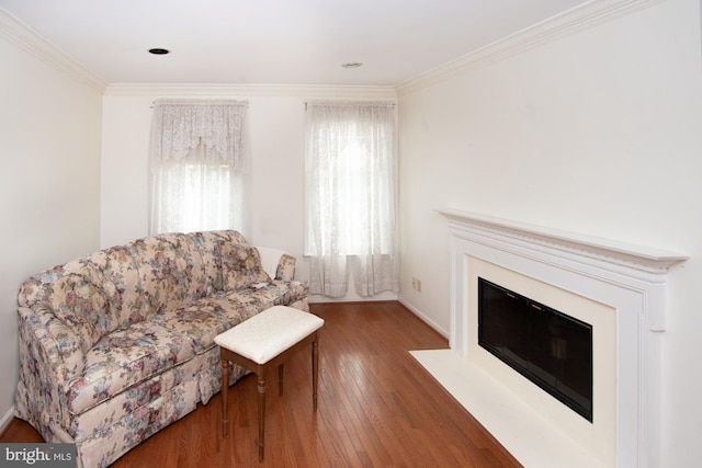 3920 Seneca Ct, Skippack, PA 19474 - living room with a fireplace with flush hearth, ornamental molding, and wood finished floors