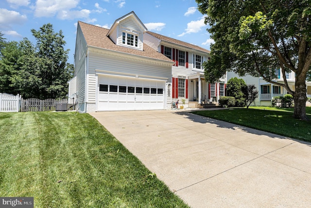 6 Oxen Ct, Stafford, VA 22554 - view of front of house with a garage, concrete driveway, and a shingled roof