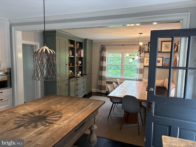 1147 Jericho Rd, Abington, PA 19001 - dining area with crown molding, wood finished floors, and a chandelier
