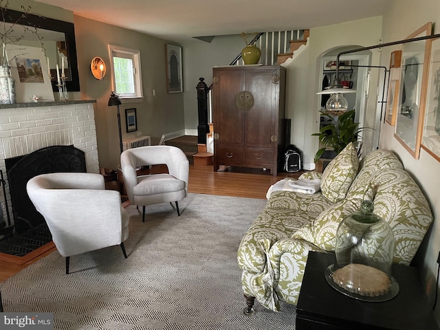 1147 Jericho Rd, Abington, PA 19001 - living room with wood finished floors and a brick fireplace