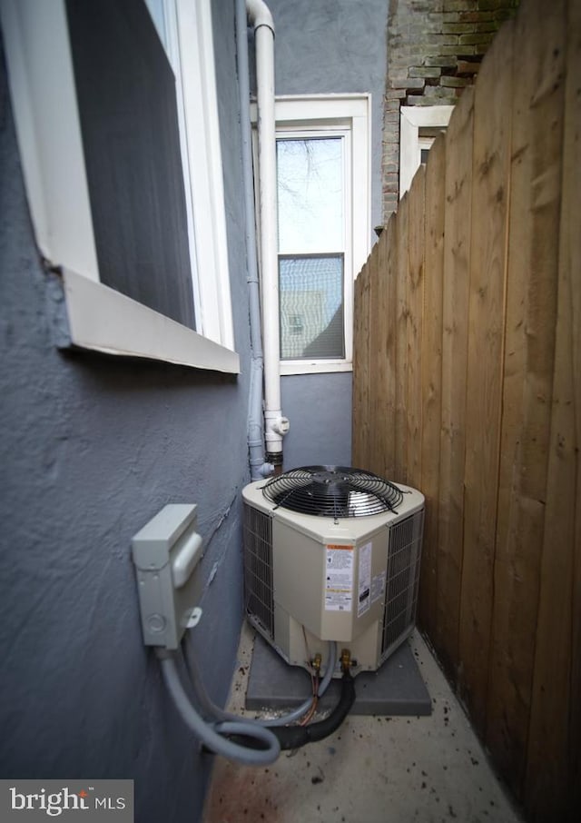 3124 N Carlisle St, Philadelphia, PA 19132 - exterior view of a central air condition unit and stucco siding