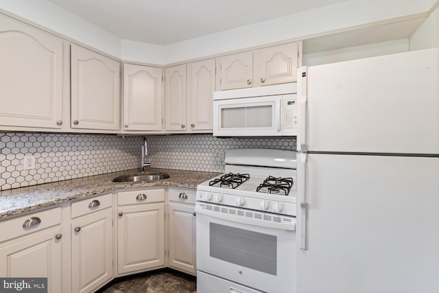 1615 S 16th St, Philadelphia, PA 19145 - kitchen featuring white appliances, backsplash, and light stone counters