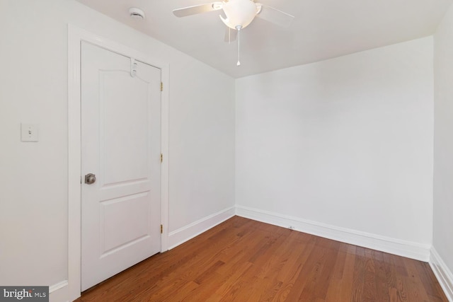 1615 S 16th St, Philadelphia, PA 19145 - spare room featuring a smoke detector, a ceiling fan, and wood finished floors