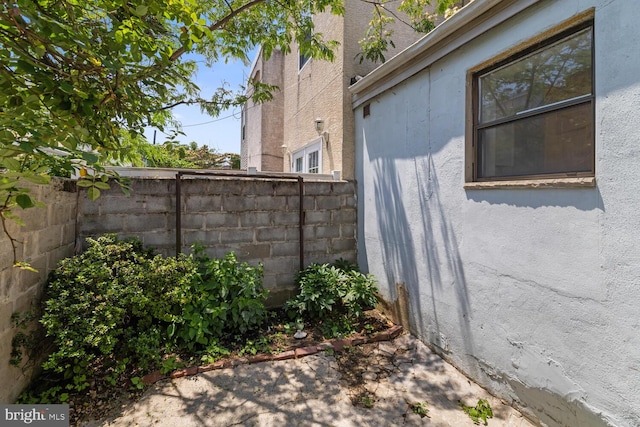 1615 S 16th St, Philadelphia, PA 19145 - view of side of property featuring stucco siding
