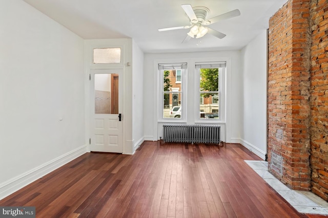 1615 S 16th St, Philadelphia, PA 19145 - spare room with radiator, hardwood / wood-style floors, and ceiling fan