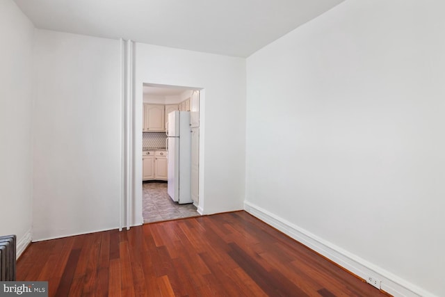 1615 S 16th St, Philadelphia, PA 19145 - spare room featuring wood finished floors and baseboards