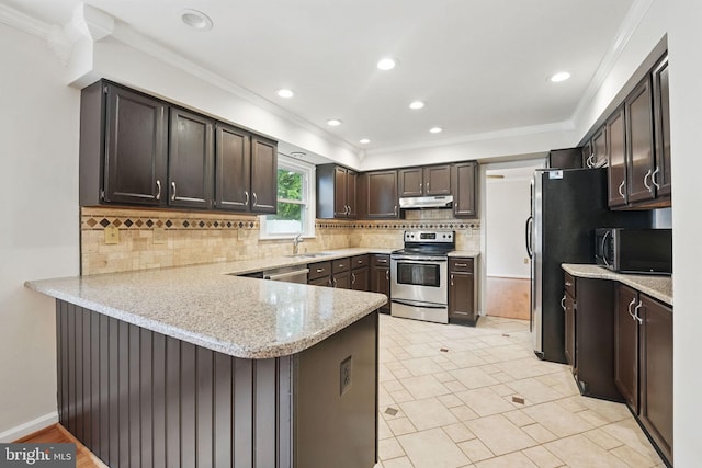 4009 Gypsum Hill Rd, Haymarket, VA 20169 - kitchen featuring stainless steel appliances, a peninsula, crown molding, under cabinet range hood, and tasteful backsplash