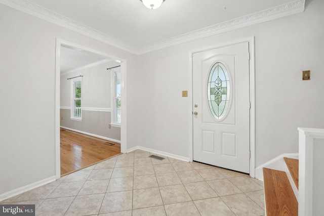 4009 Gypsum Hill Rd, Haymarket, VA 20169 - entrance foyer with ornamental molding, light tile patterned floors, and stairway