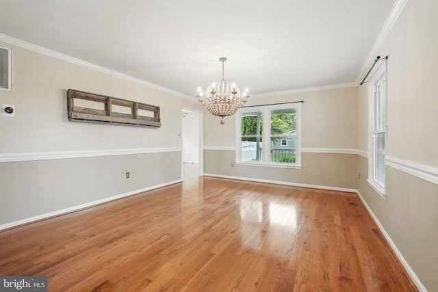 4009 Gypsum Hill Rd, Haymarket, VA 20169 - unfurnished room with a chandelier, light wood finished floors, and ornamental molding