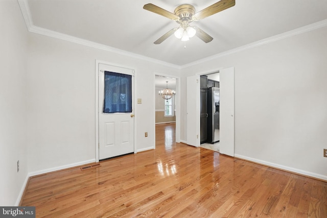 4009 Gypsum Hill Rd, Haymarket, VA 20169 - unfurnished room featuring a chandelier, ornamental molding, light wood-style floors, and ceiling fan