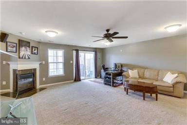 45952 Iron Oak Ter, Sterling, VA 20166 - living area featuring a fireplace with flush hearth, carpet floors, and ceiling fan