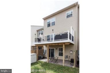 45952 Iron Oak Ter, Sterling, VA 20166 - rear view of property featuring a patio area and a balcony