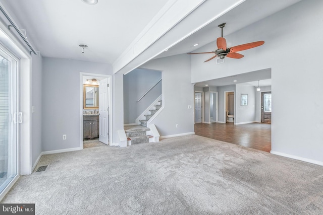 83 Morton Dr, Manahawkin, NJ 08050 - unfurnished living room with carpet floors, stairs, a ceiling fan, and recessed lighting