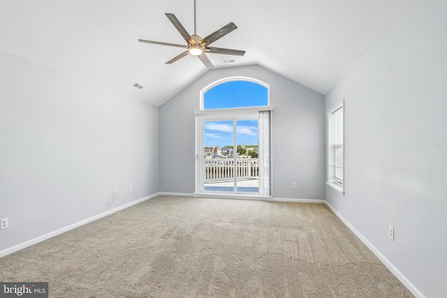 83 Morton Dr, Manahawkin, NJ 08050 - empty room featuring a ceiling fan, carpet floors, vaulted ceiling, and healthy amount of natural light