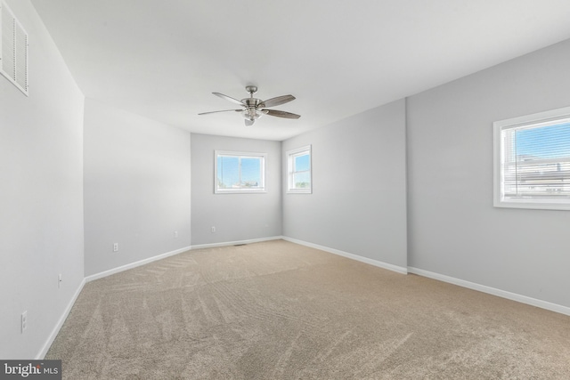 83 Morton Dr, Manahawkin, NJ 08050 - empty room featuring light colored carpet and a ceiling fan