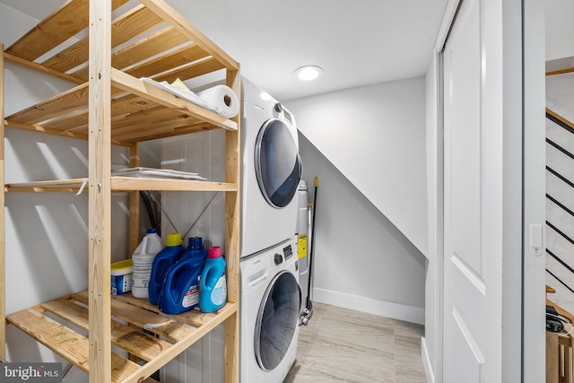 2230 Watkins St, Philadelphia, PA 19145 - washroom featuring estacked washer and dryer and baseboards