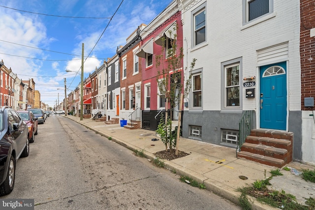 2230 Watkins St, Philadelphia, PA 19145 - view of asphalt street featuring entry steps, street lights, sidewalks, and curbs