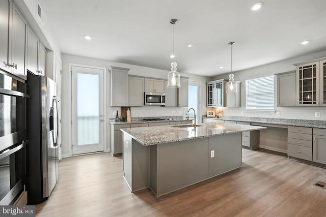 18286 Summit Pointe Dr, Triangle, VA 22172 - kitchen with gray cabinetry, appliances with stainless steel finishes, an island with sink, and recessed lighting