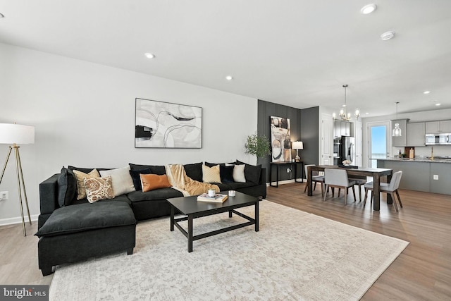 18286 Summit Pointe Dr, Triangle, VA 22172 - living room featuring a chandelier, light wood-style floors, and recessed lighting