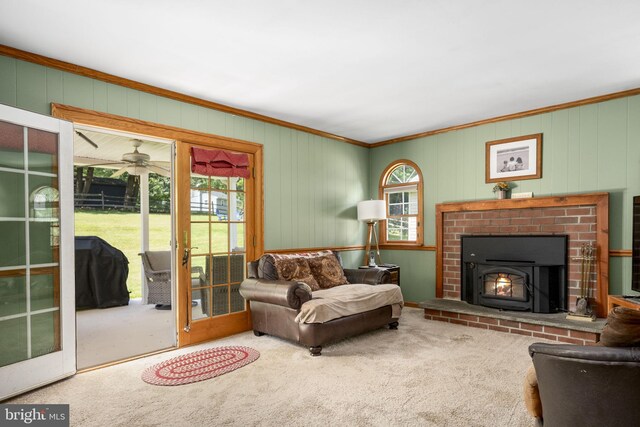 1559 Washington Ln, West Chester, PA 19382 - living area with carpet flooring, crown molding, a ceiling fan, and a brick fireplace