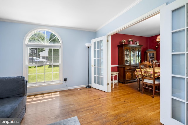 1559 Washington Ln, West Chester, PA 19382 - living area with french doors, crown molding, and wood finished floors