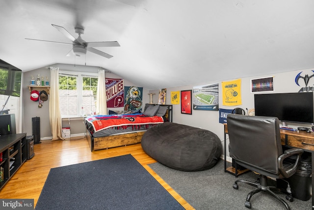 1559 Washington Ln, West Chester, PA 19382 - bedroom featuring wood finished floors, a desk, vaulted ceiling, and a ceiling fan