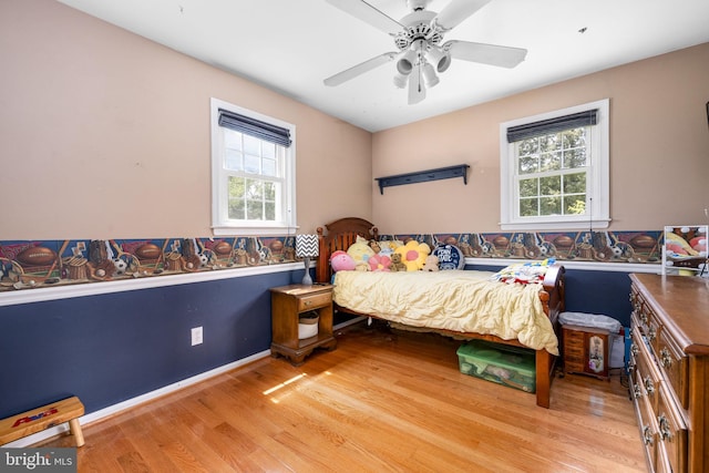 1559 Washington Ln, West Chester, PA 19382 - bedroom with multiple windows, wood finished floors, and ceiling fan